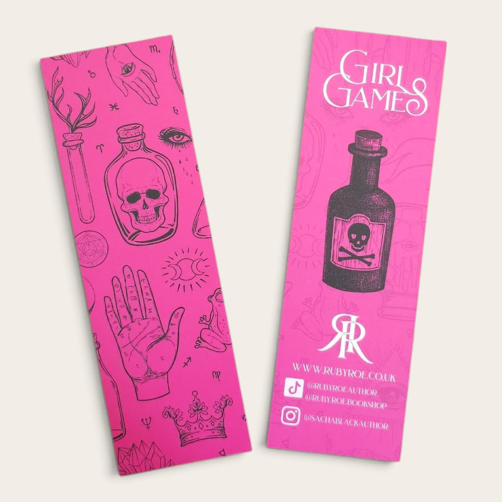 Two pink rectangular bookmarks with black occult-style illustrations and white text, shown on a light beige background. One features a skull in a bottle, a hand, and a crown; the other features a skull-and-crossbones bottle, the words 'Girls Games,' and author/social media text.