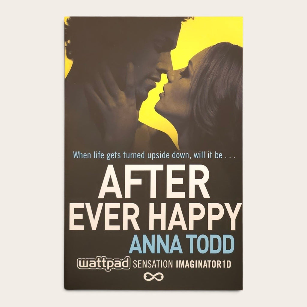 A book cover for 'After Ever Happy' by Anna Todd, featuring a dark brown and yellow design with a couple's faces and white and blue text, displayed on a light beige background.