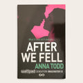A book cover for 'After We Fell' by Anna Todd, featuring a dark gray background with a bright pink silhouette of a couple's faces and bold white and green text. The Wattpad logo is visible at the bottom.