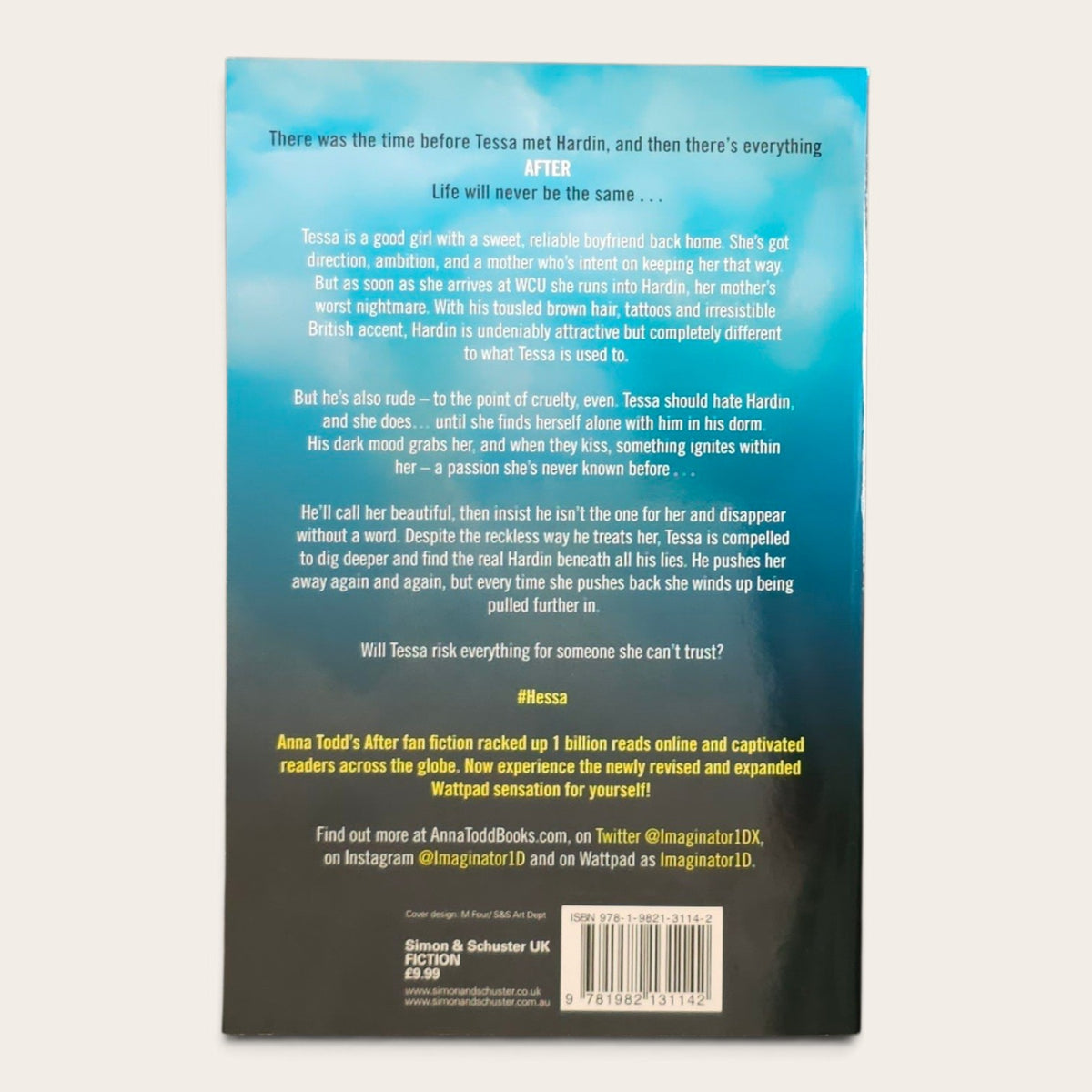 The back cover of the book 'After' by Anna Todd' from the After Fan Fiction series, featuring a light blue top half with white text and a black bottom half with a barcode and publisher details.