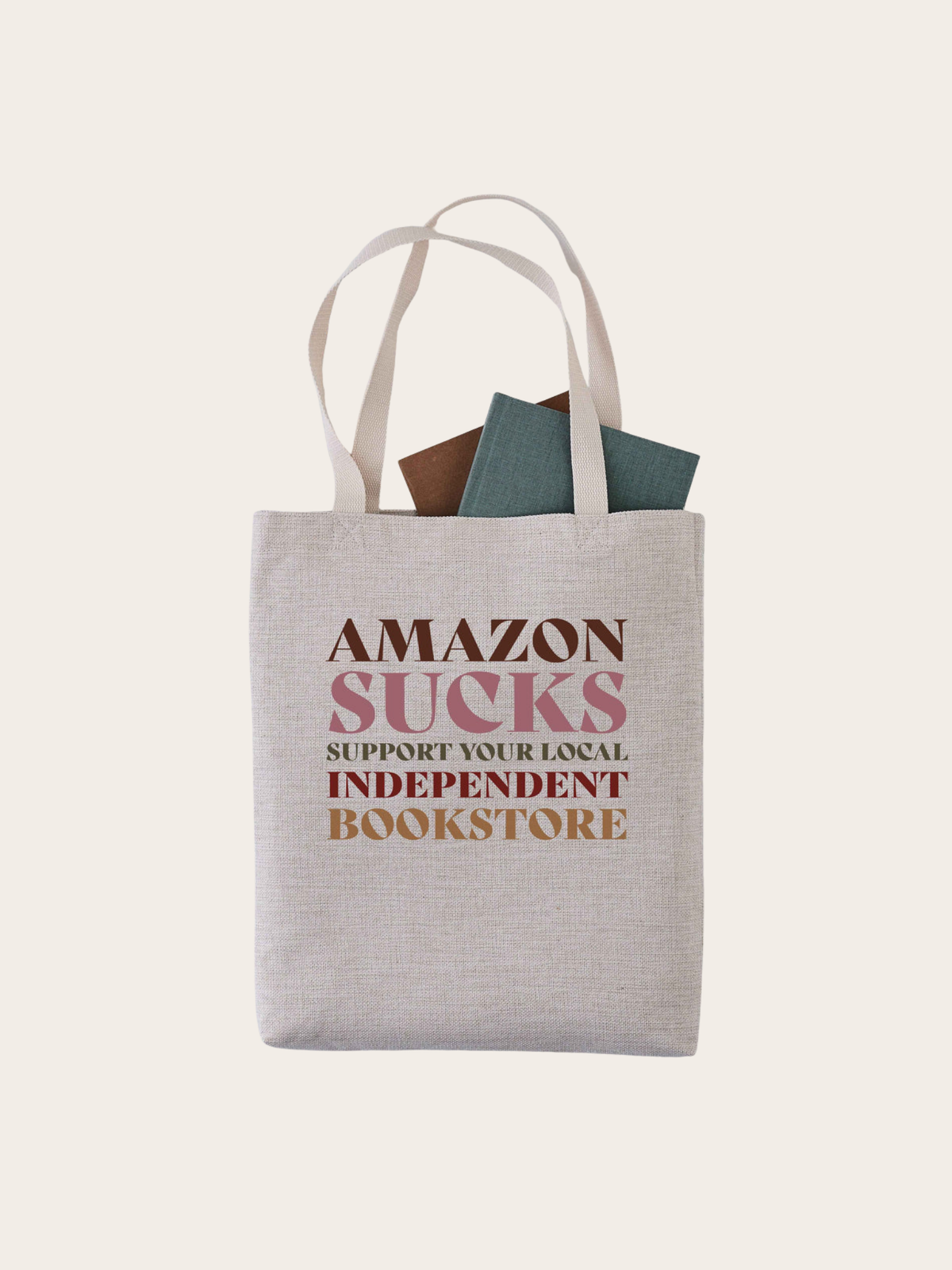 linen tote bag with "amazon sucks support your local independent bookstore"