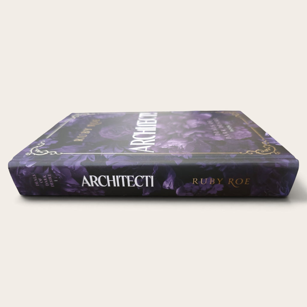 A hardcover book titled 'ARCHITECTI' by Ruby Roe, featuring a dark purple floral pattern with gold decorative borders and white and gold lettering on the spine, set against a plain light beige background.