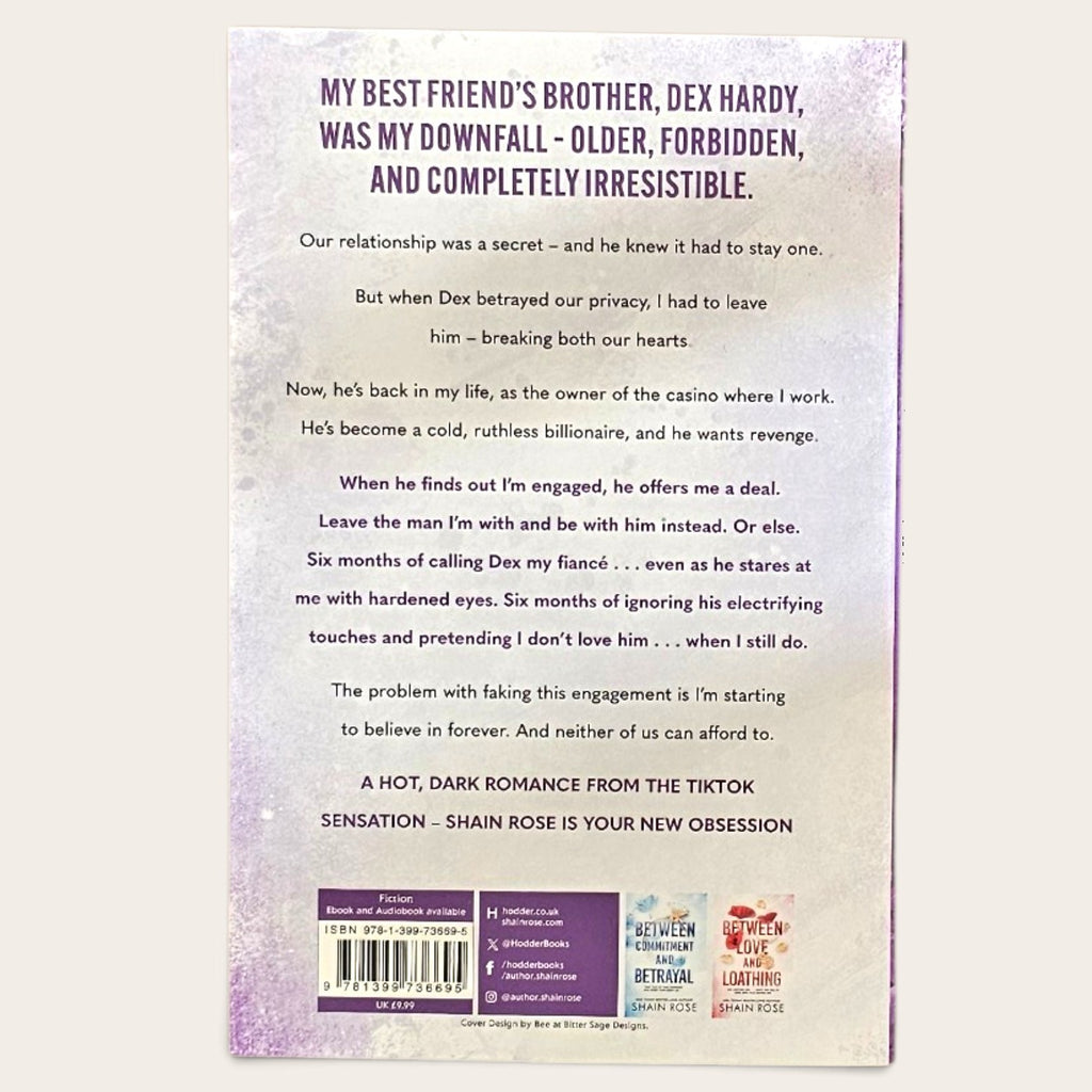 The back cover of a book titled 'Between Never and Forever'  by Shain Rose, featuring a purple and white design with a barcode and author details.