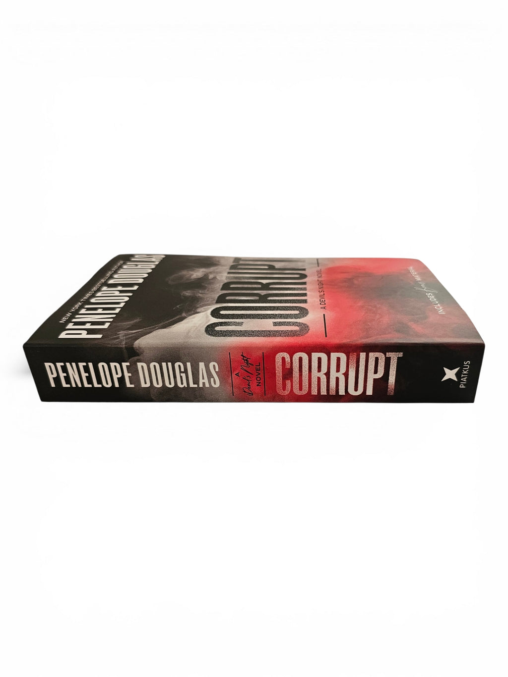 The book 'Corrupt' by Penelope Douglas, showing the front cover and spine against a plain white background.