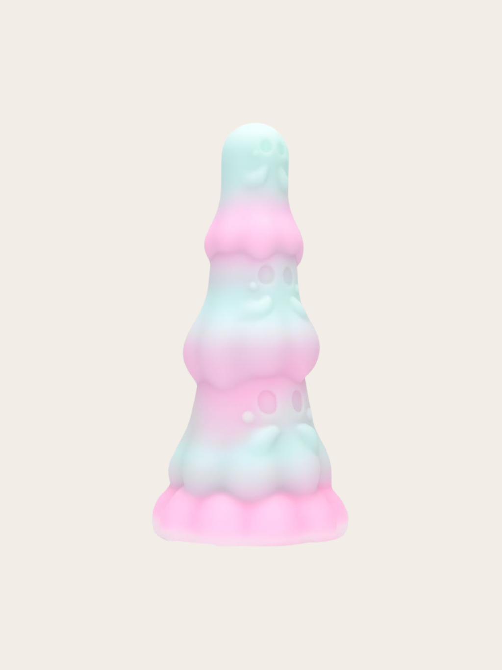 A pastel gradient dildo with a smooth, matte finish, featuring a color transition from mint green to light pink and back to mint green, set against a solid off-white background.