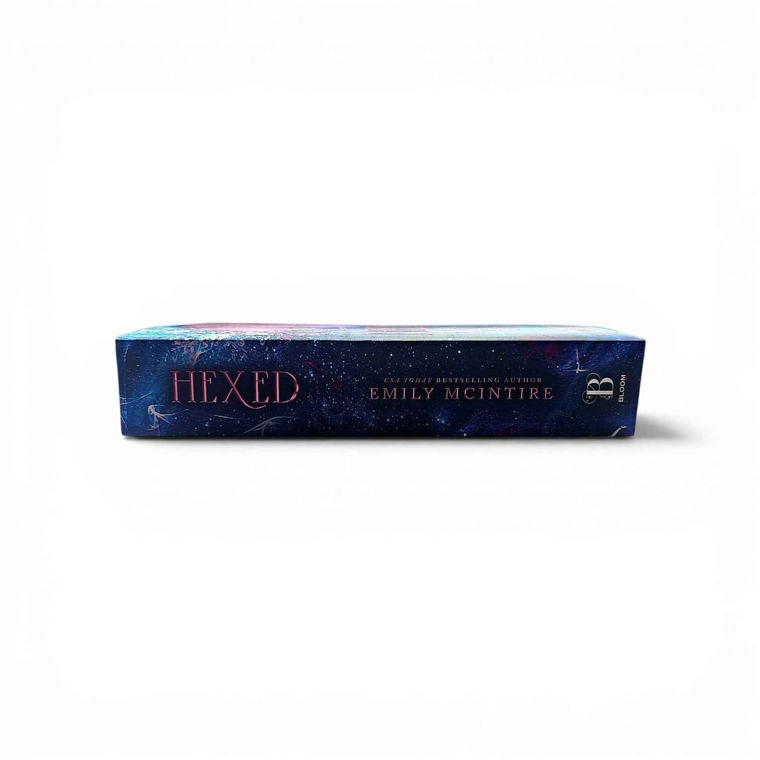 Hexed by Emily McIntire (Never After Series 6) A dark The Little Mermaid reimagining following a cunning hitwoman who falls into a forbidden, high-stakes mafia romance with her cousin's fiancé.