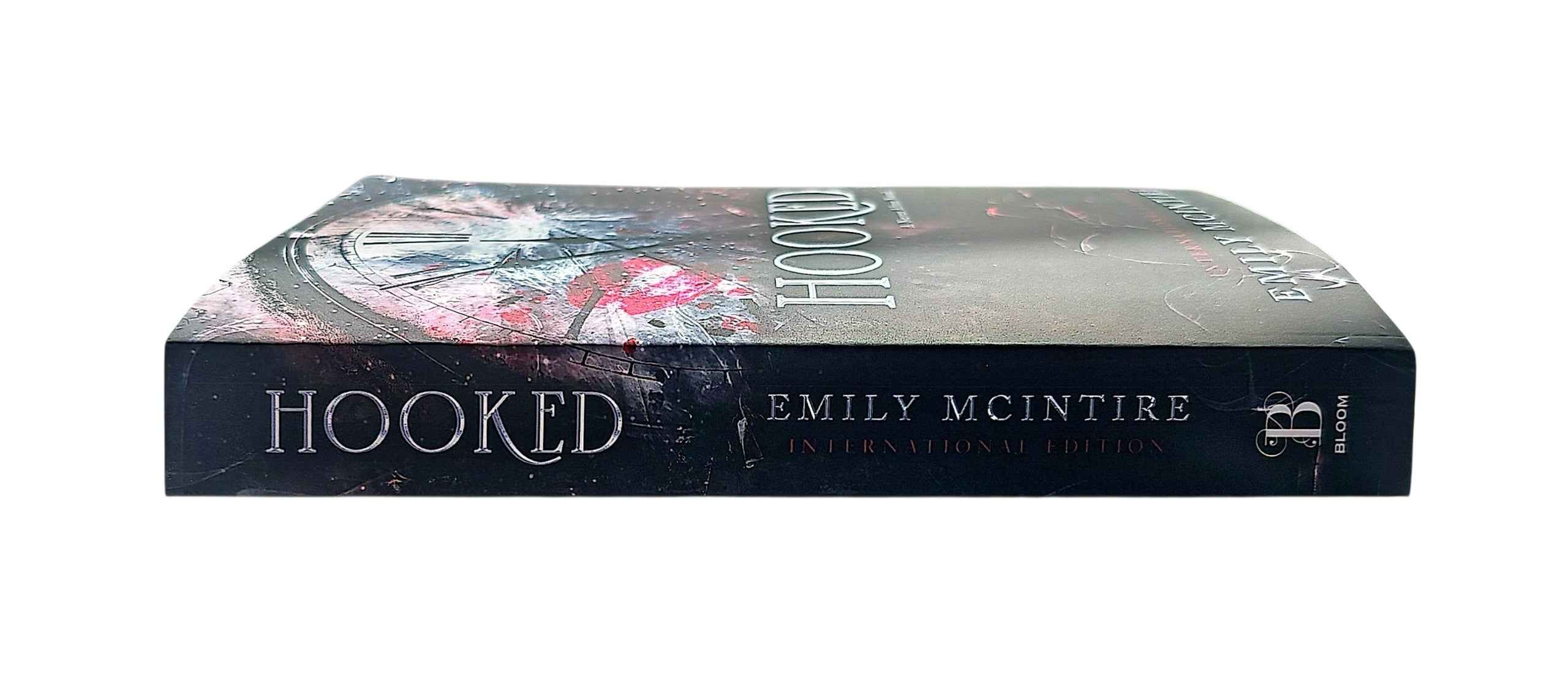 Hooked by Emily McIntire (Never After Series 1) a dark fractured fairytale spicy mafia romance based on Peter pan.