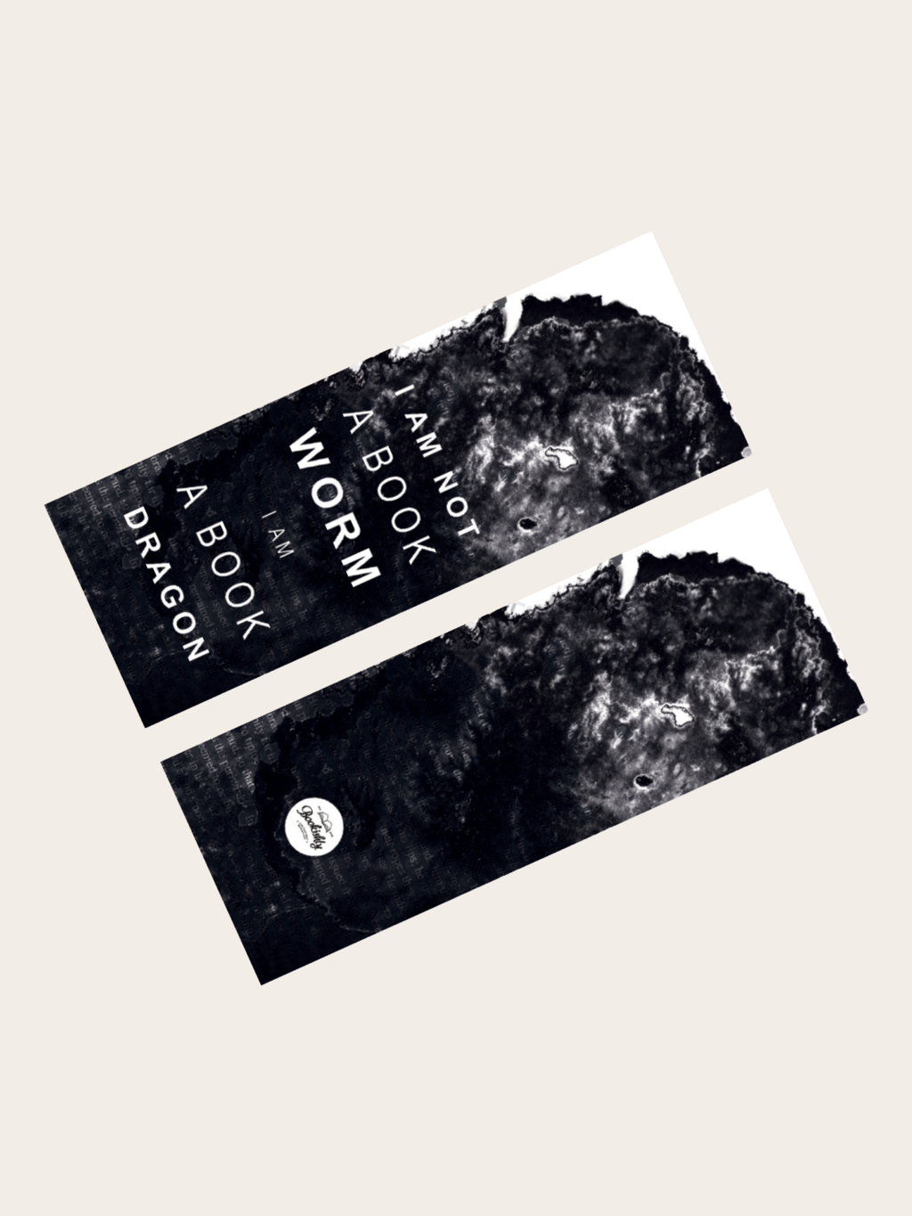 A bookmark with "I am not a book worm, I am  a book dragon"