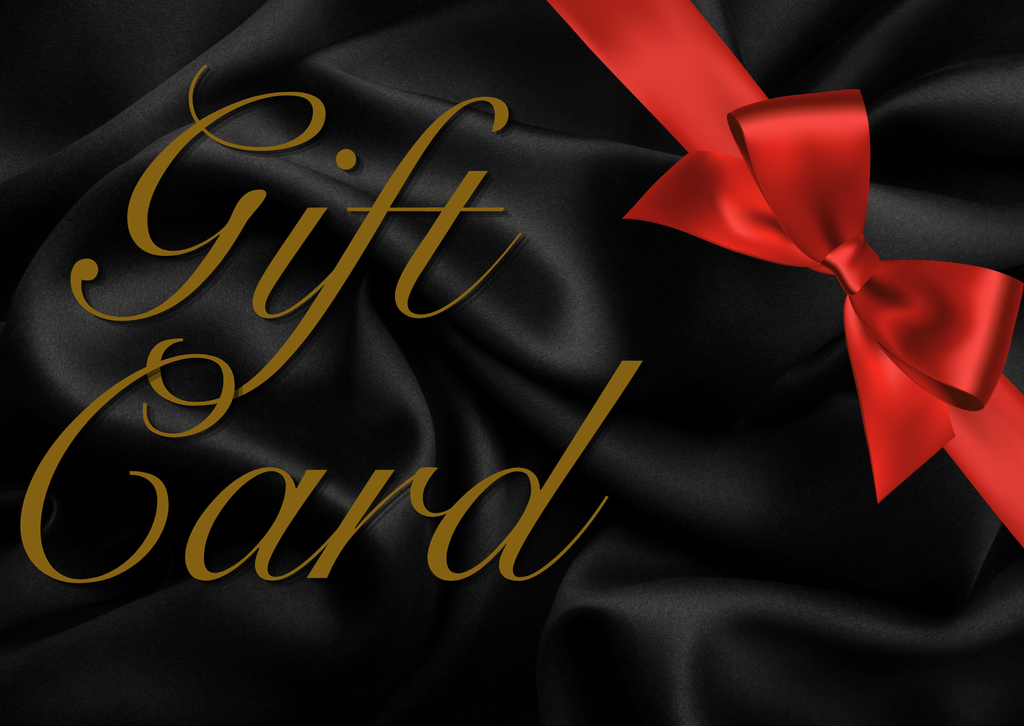 A black gift card design with elegant gold cursive text reading 'Gift Card' over a black satin-like background, accented by a bright red ribbon and bow.