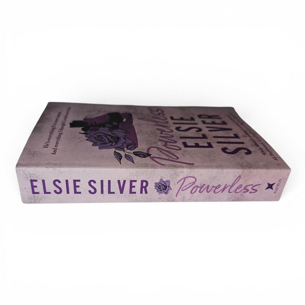 Powerless by Elsie Silver on a clean white background.  A small town cowboy spicy romance. Sports Romance. 