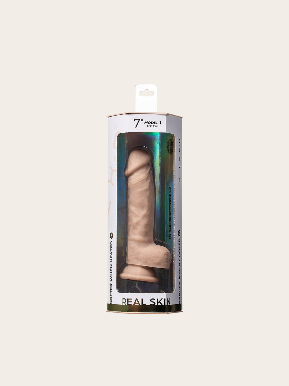 Image shows a skin coloured dildo in a retail box