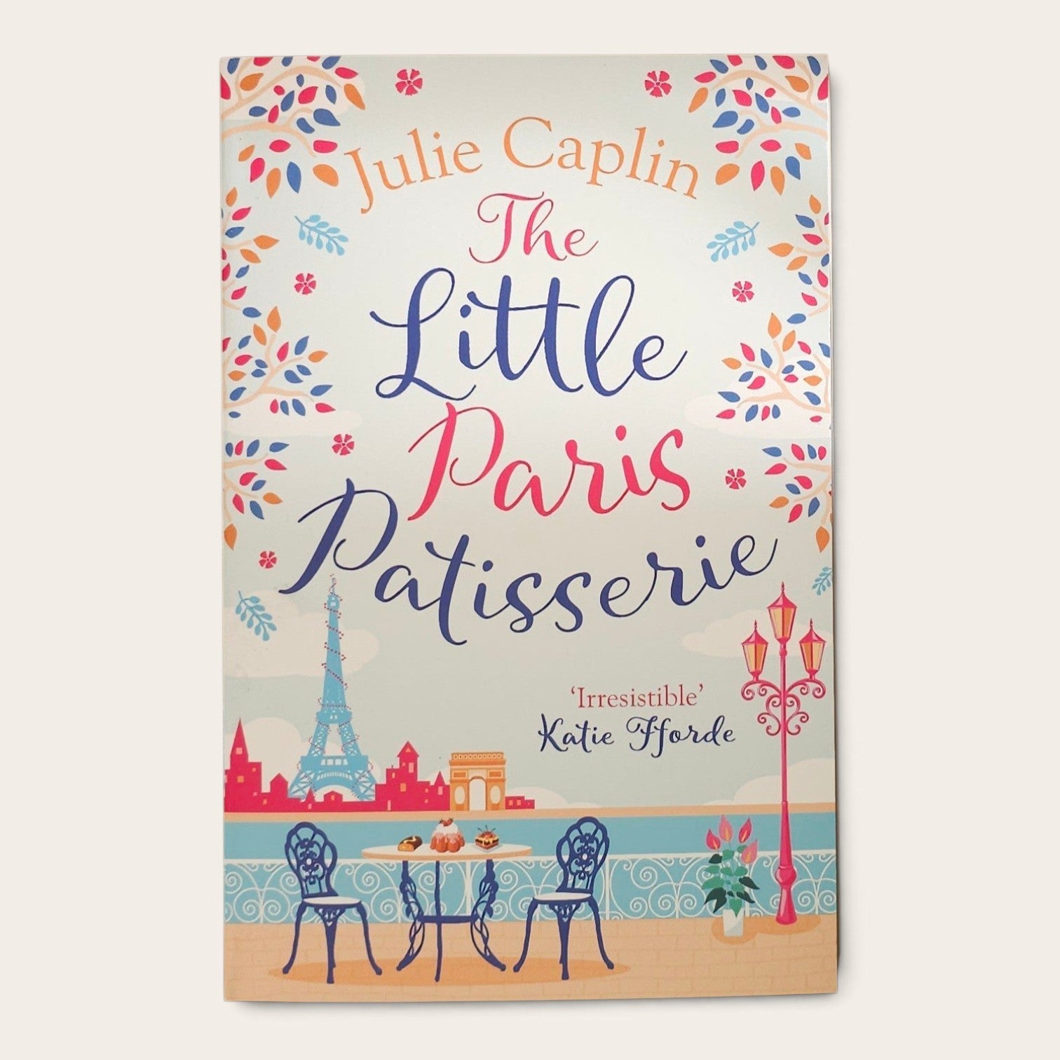 The Little Paris Patisserie by Julie Caplin on a beige background