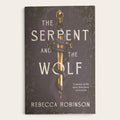 The book cover of 'The Serpent and the Wolf' by Rebecca Robinson, featuring a dark brown background with ornate floral patterns, a gold sword, and a dark serpent wrapping around it.