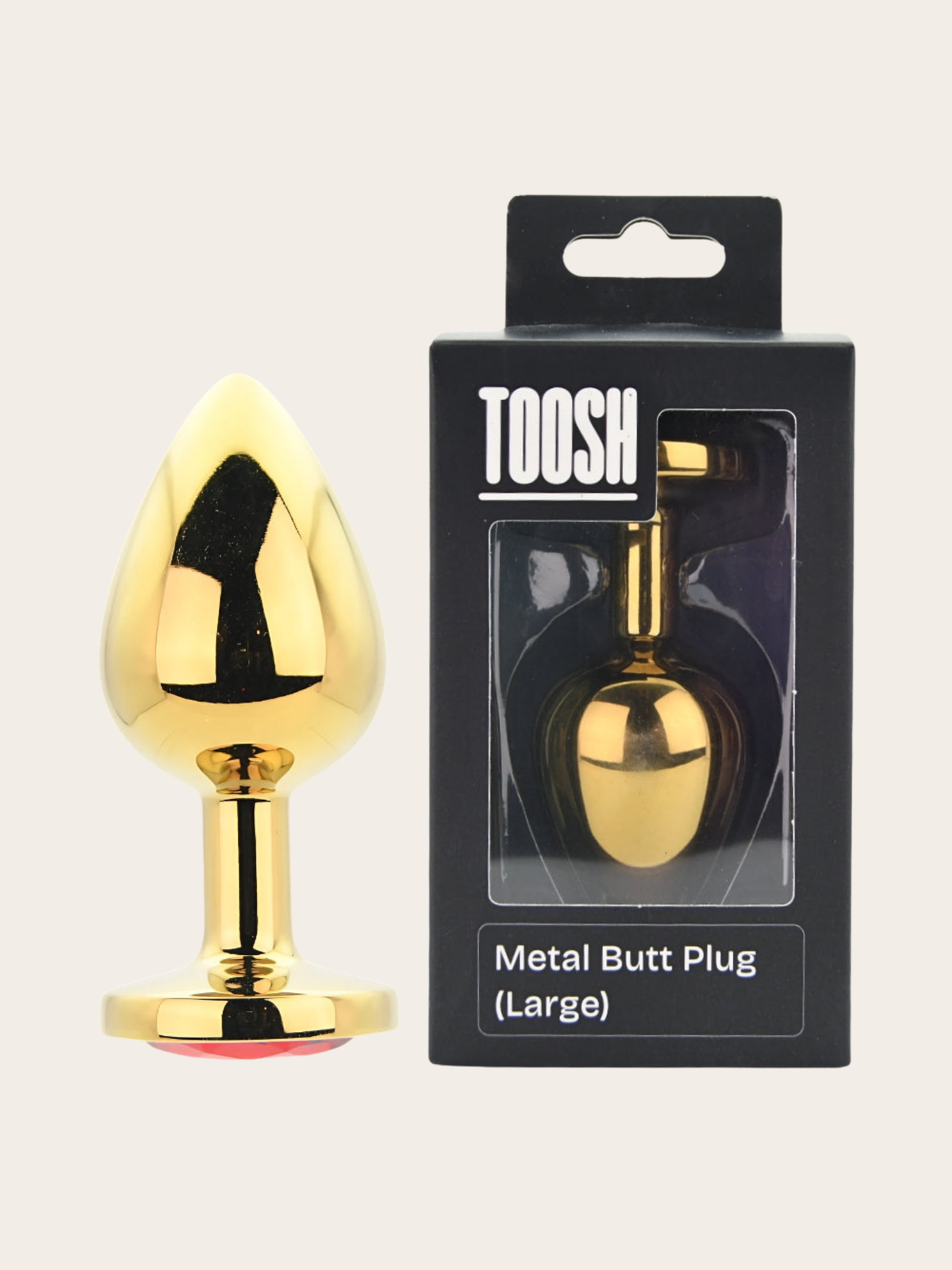 A shiny gold metal butt plug shown next to its black retail box labeled TOOSH and 'Metal Butt Plug (Large)'.
