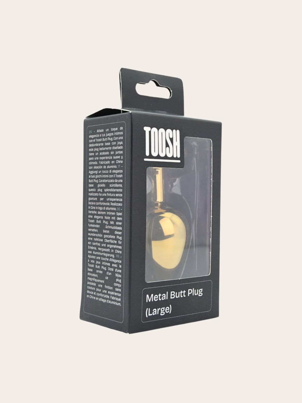 TOOSH brand packaging box for a Metal Butt Plug (Large), featuring a black box with a clear window showing the gold-colored plug inside, set against a solid light beige background.