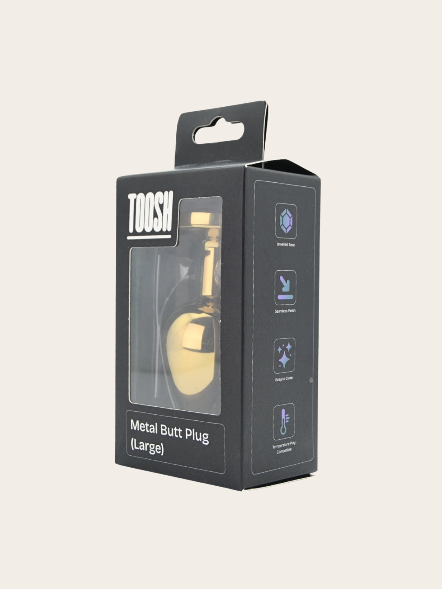 TOOSH brand packaging box for a Metal Butt Plug (Large), featuring a black box with a clear window showing the gold-colored plug inside, set against a solid light beige background.