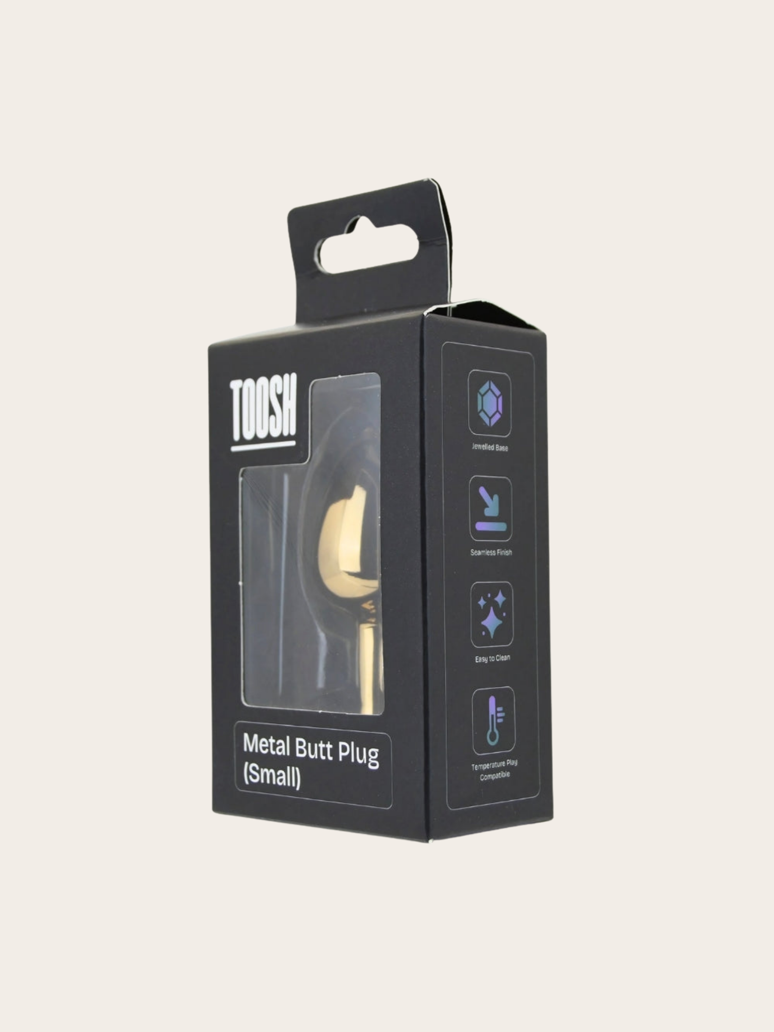 TOOSH brand black retail packaging box for a small metal butt plug, featuring a clear window showing the gold-toned product inside and feature icons on the side.