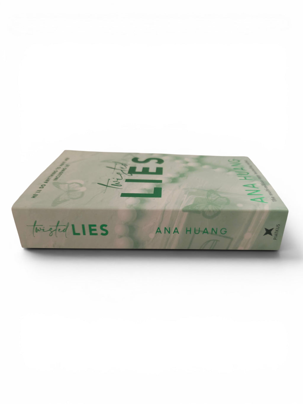 Twisted Lies book by Ana Huang, featuring a pale sage green cover with green text and subtle floral line art, shown on a clean white background.