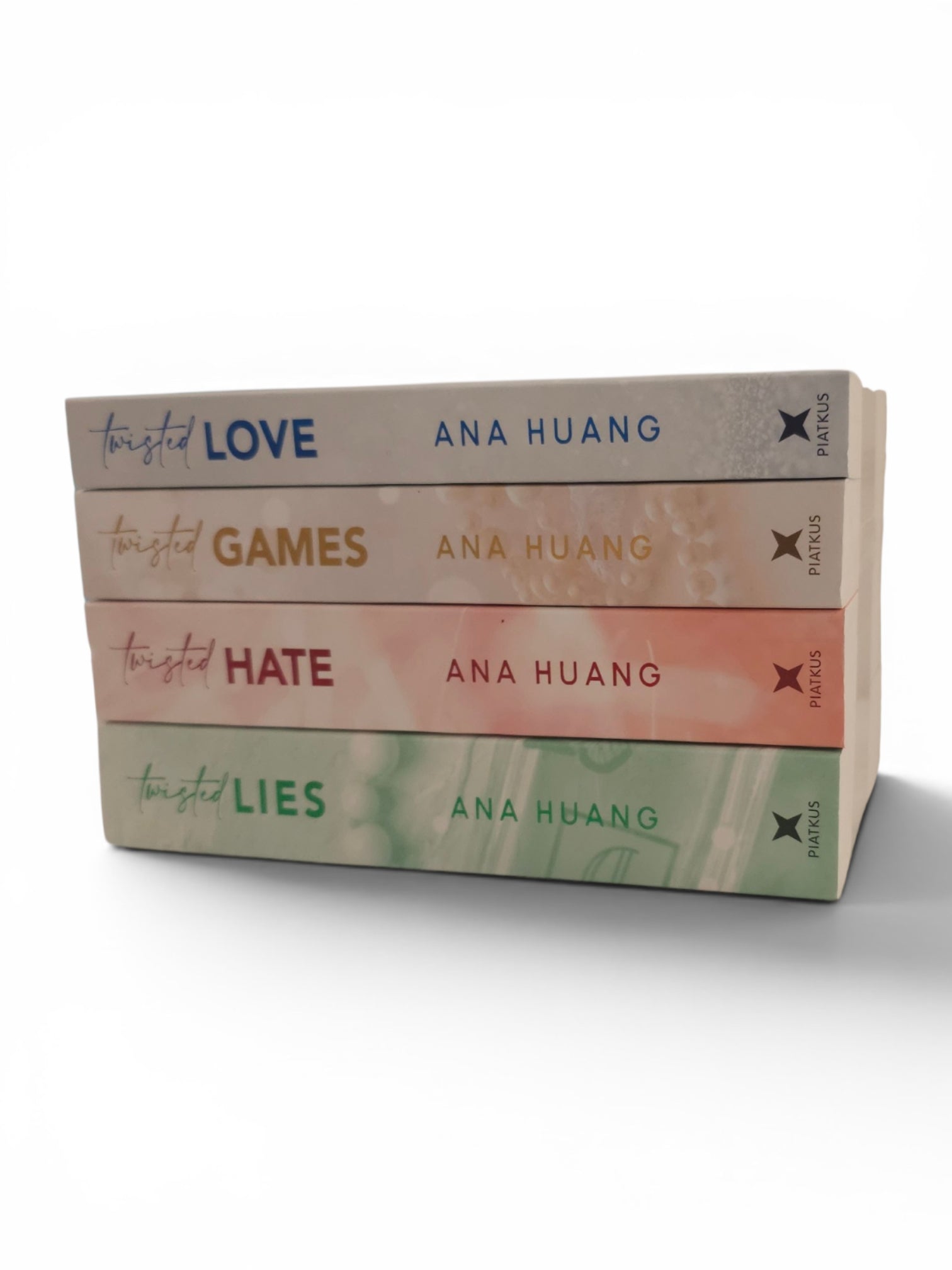 Four paperback books from the 'Twisted' series by Ana Huang are stacked vertically on a white background. The spines show pastel-colored covers: beige for 'Love', peach for 'Games', coral pink for 'Hate', and mint green for 'Lies'.
