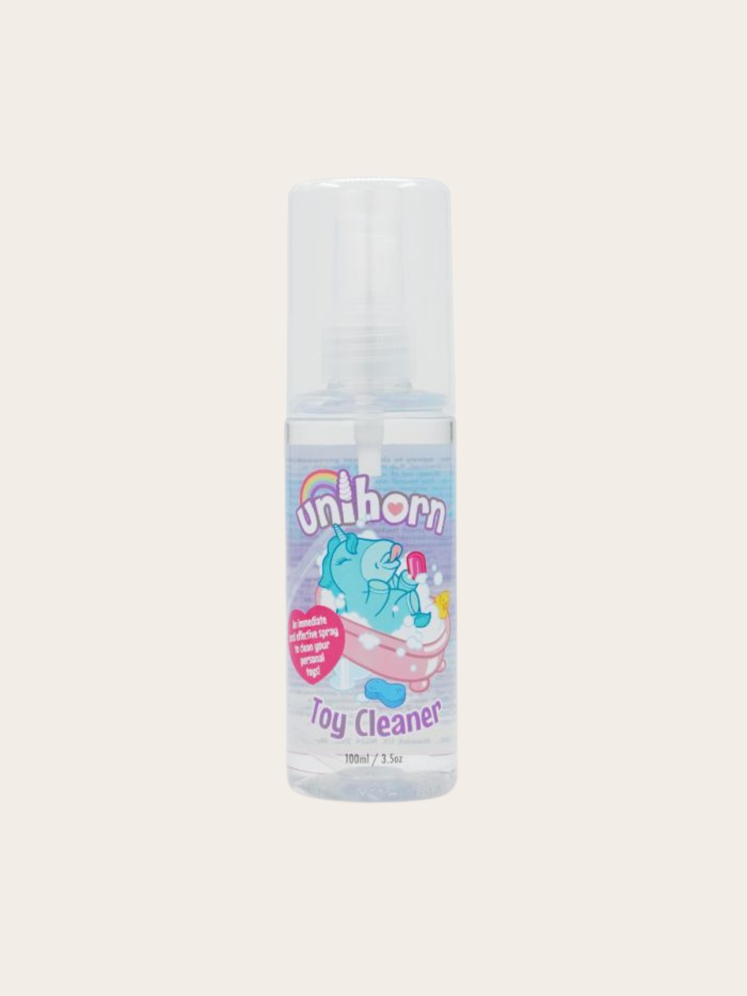 A small clear plastic spray bottle labeled 'Unihorn Toy Cleaner' with pastel unicorn artwork on a light beige background.