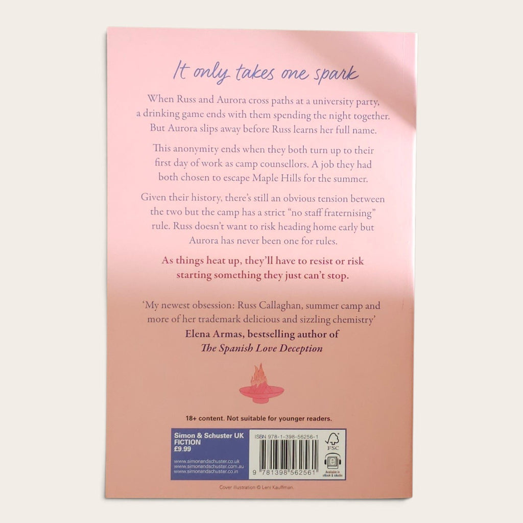 The back cover of a paperback book, showing a synopsis of the story in. The cover has a soft pink background with a small red illustration, a blue Simon & Schuster UK logo, and a barcode.