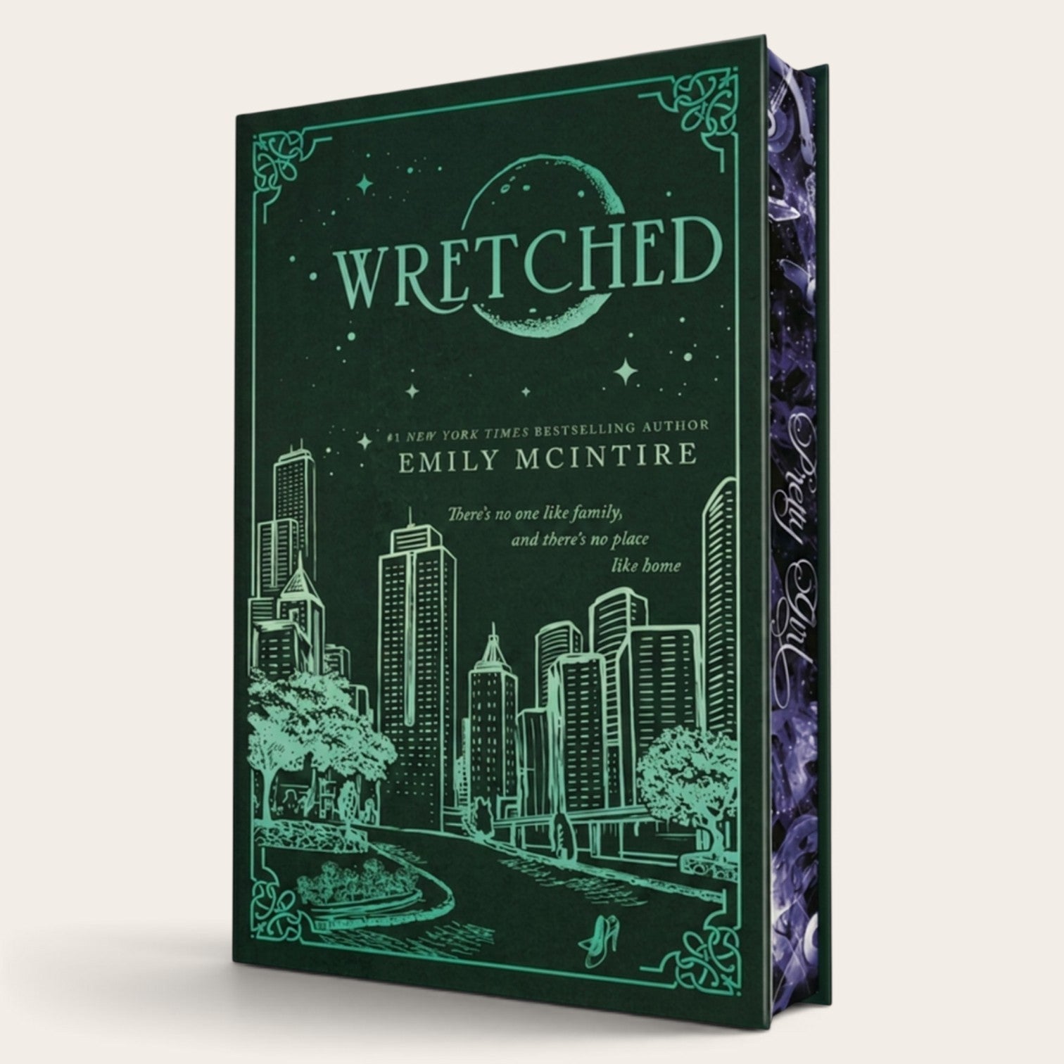 The book cover of 'Wretched' by Emily McIntire, featuring a dark green background with a teal line-art illustration of a city skyline, stars, and a crescent moon. The spine is visible on the right side, showing a purple and teal marbled pattern.